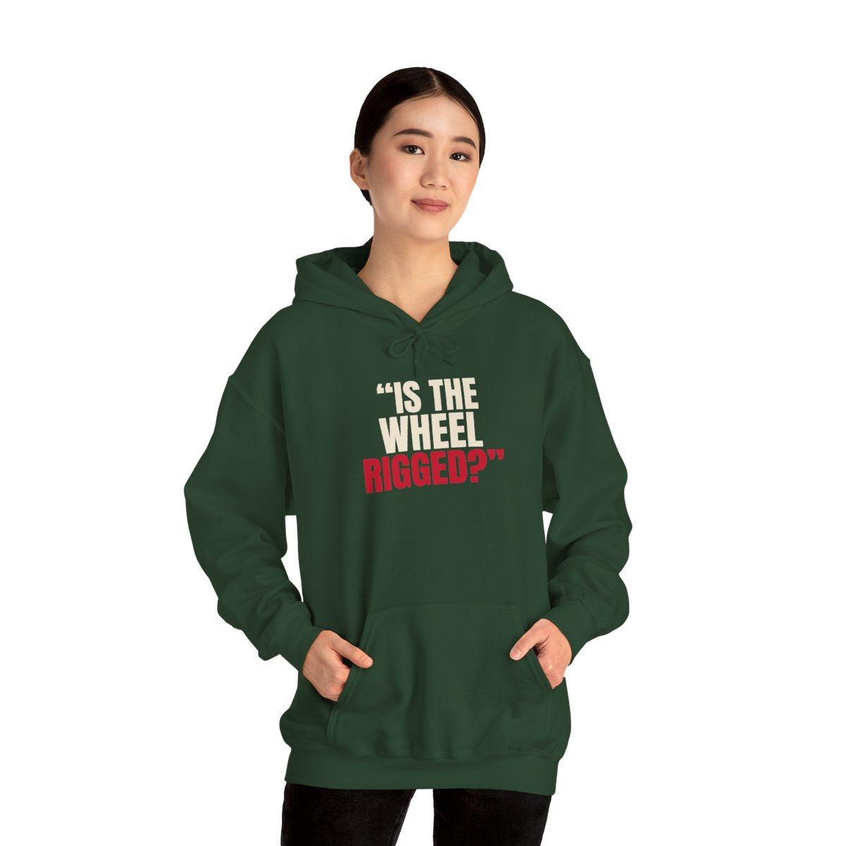 "Is the Wheel Rigged?" — Roulette Hoodie (Forest Green, worn, front)