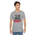"Is the Wheel Rigged?" — Roulette Tee (Athletic Heather, worn, front)