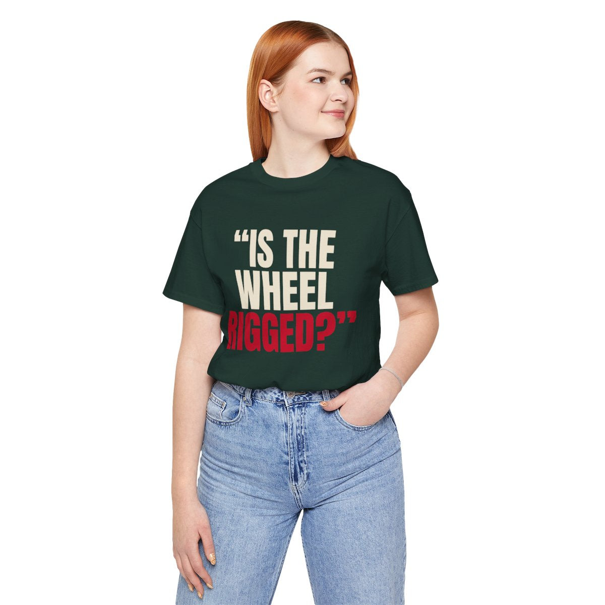 "Is the Wheel Rigged?" — Roulette Tee (Forest, worn, front)