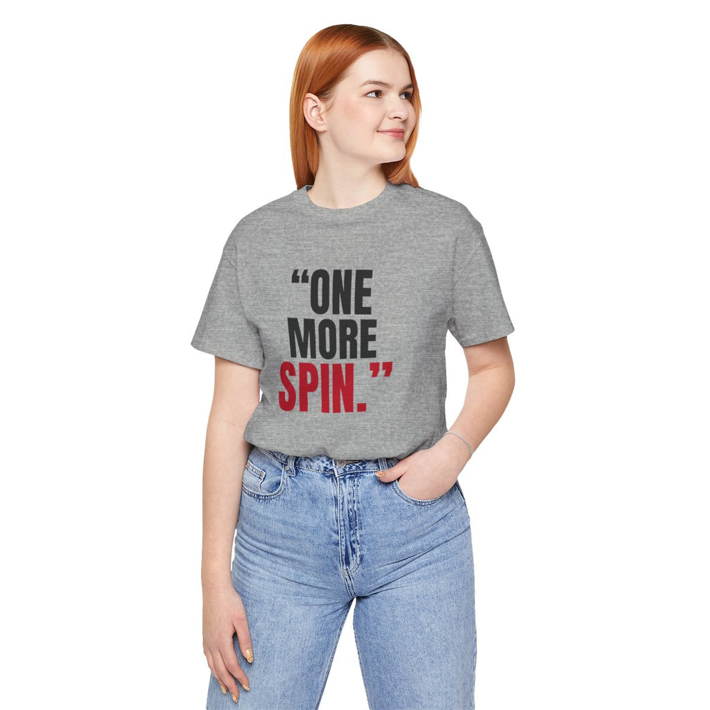 "One More Spin." — Roulette Tee (Athletic Heather, worn, front)