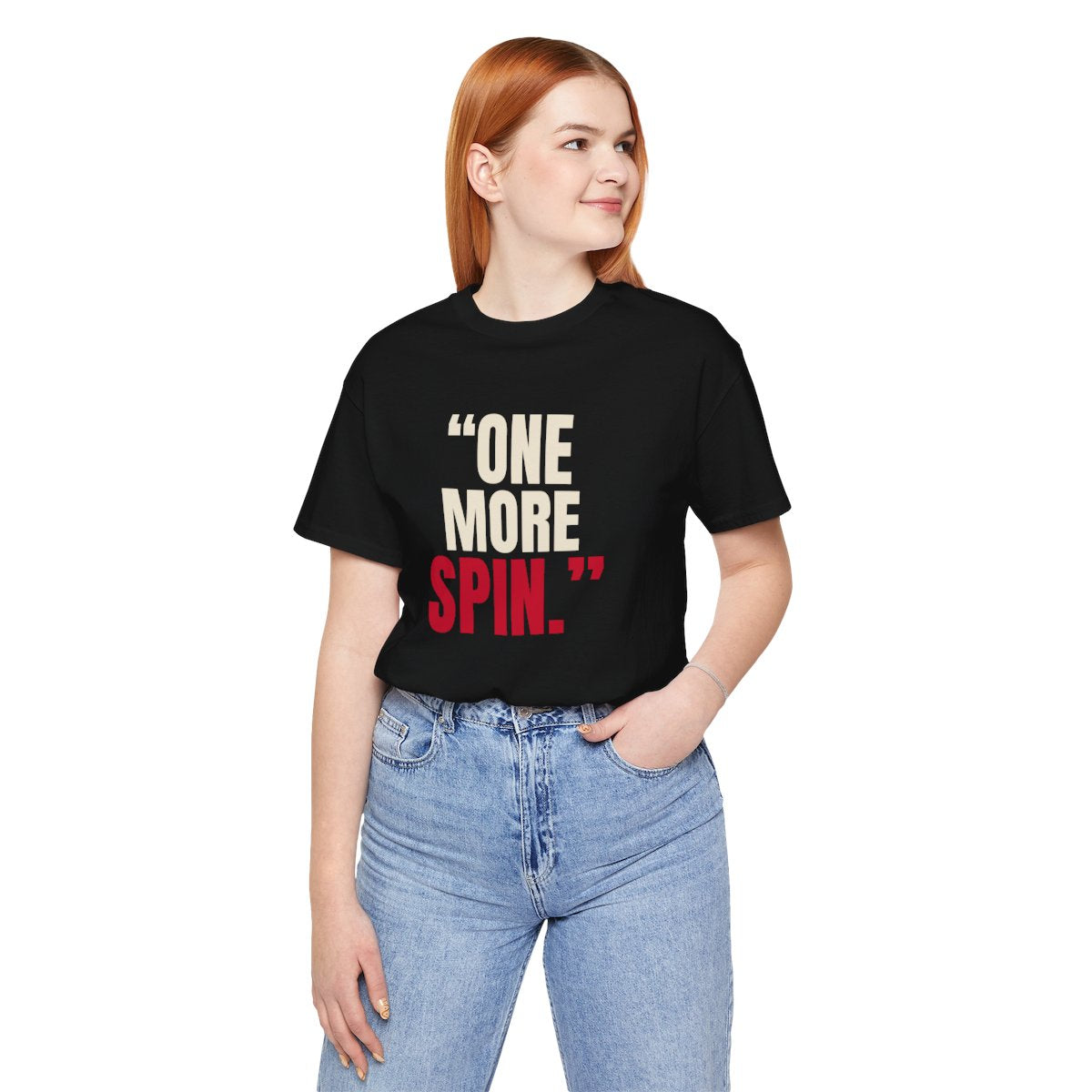 "One More Spin." — Roulette Tee (Black, worn, front)