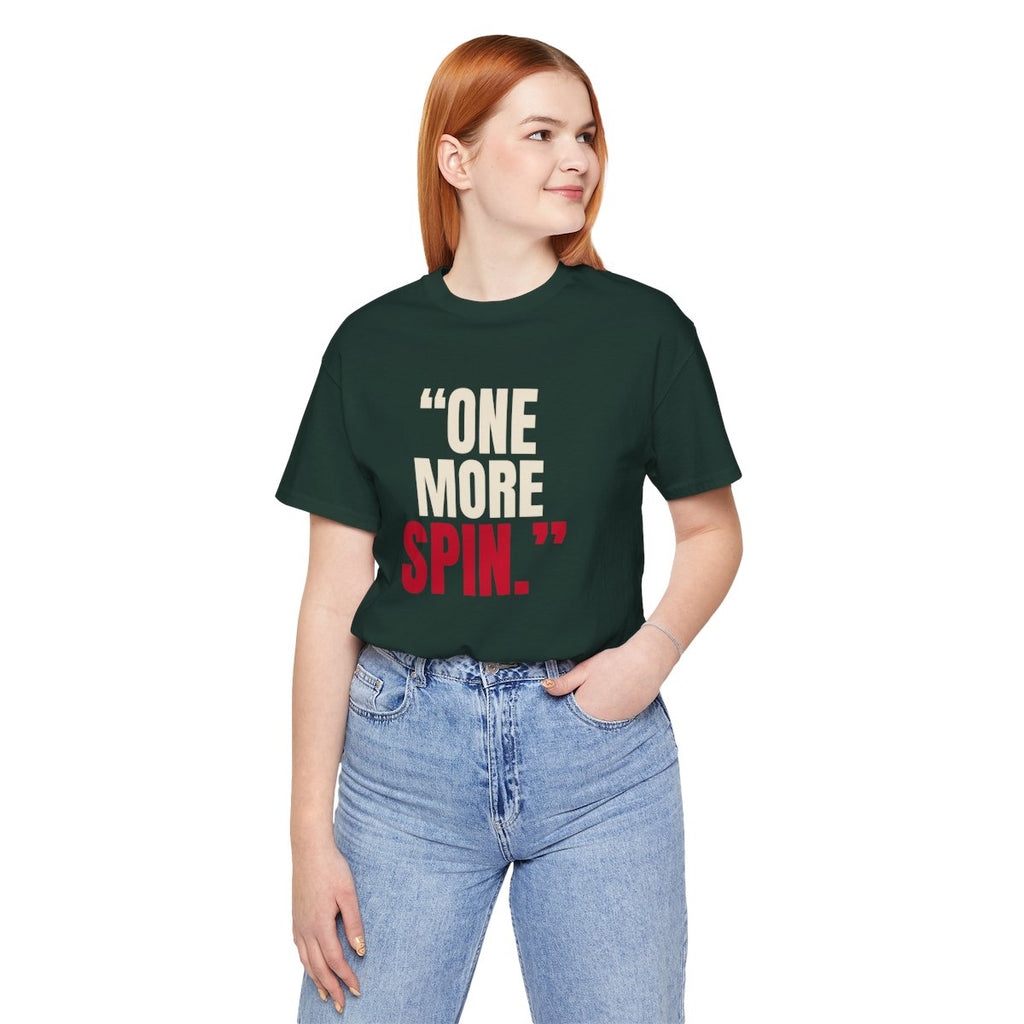 "One More Spin." — Roulette Tee (Forest, worn, front)