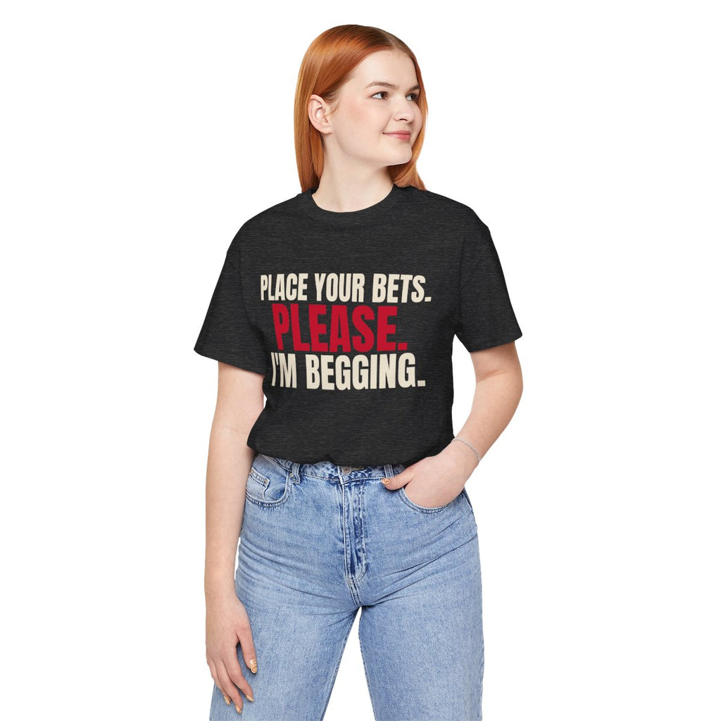 Place Your Bets. Please. I'm Begging. — Roulette Tee (Dark Grey Heather, worn, front)