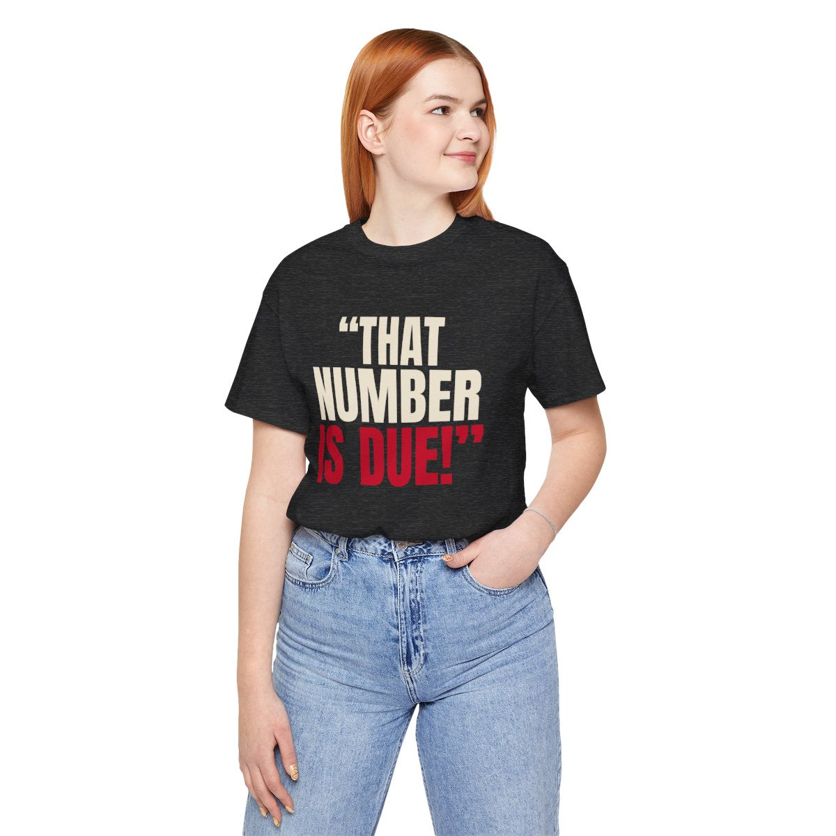 "That Number Is Due!" — Roulette Tee (Dark Grey Heather, worn, front)