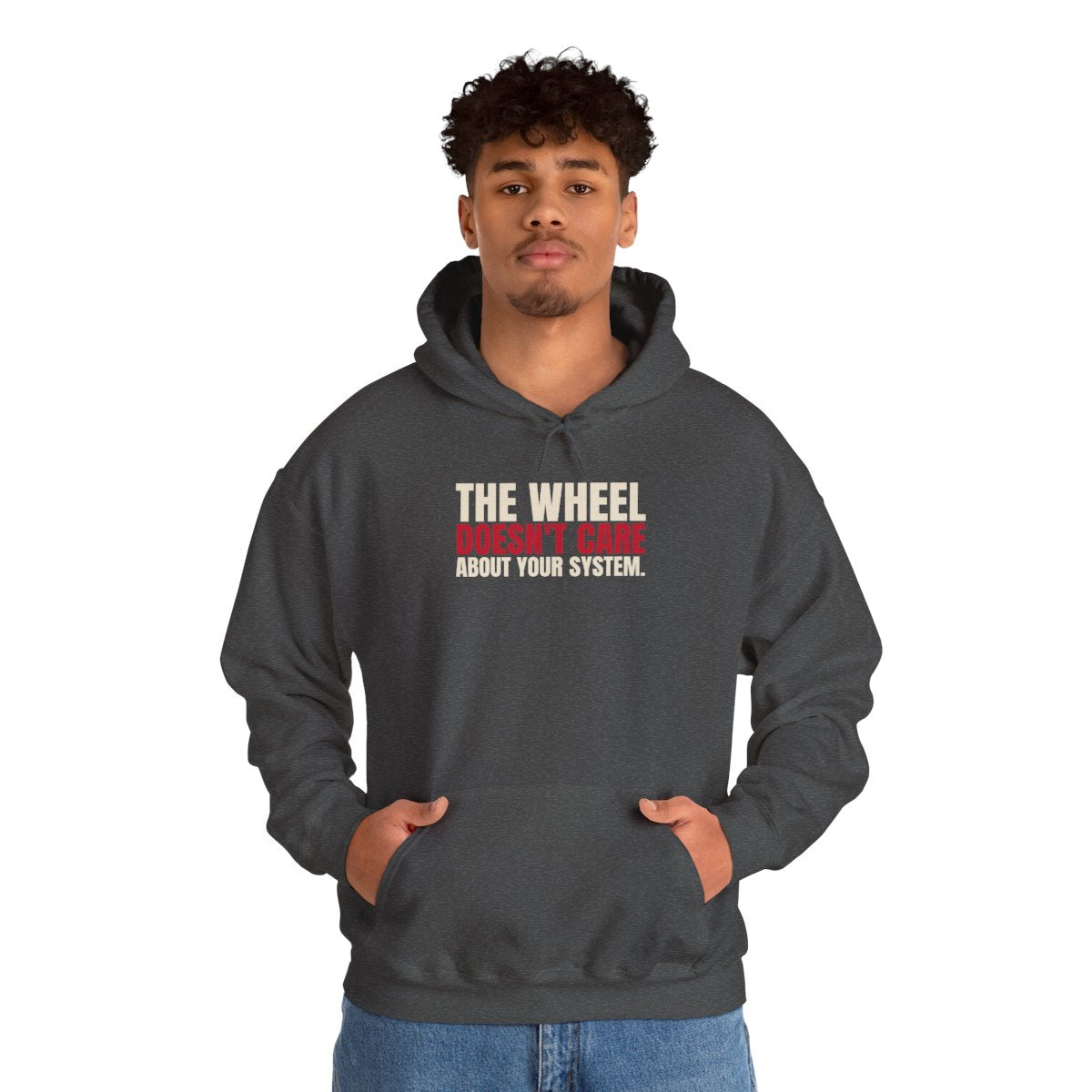 The Wheel Doesn't Care About Your System. — Roulette Hoodie (Dark Heather, worn, front)