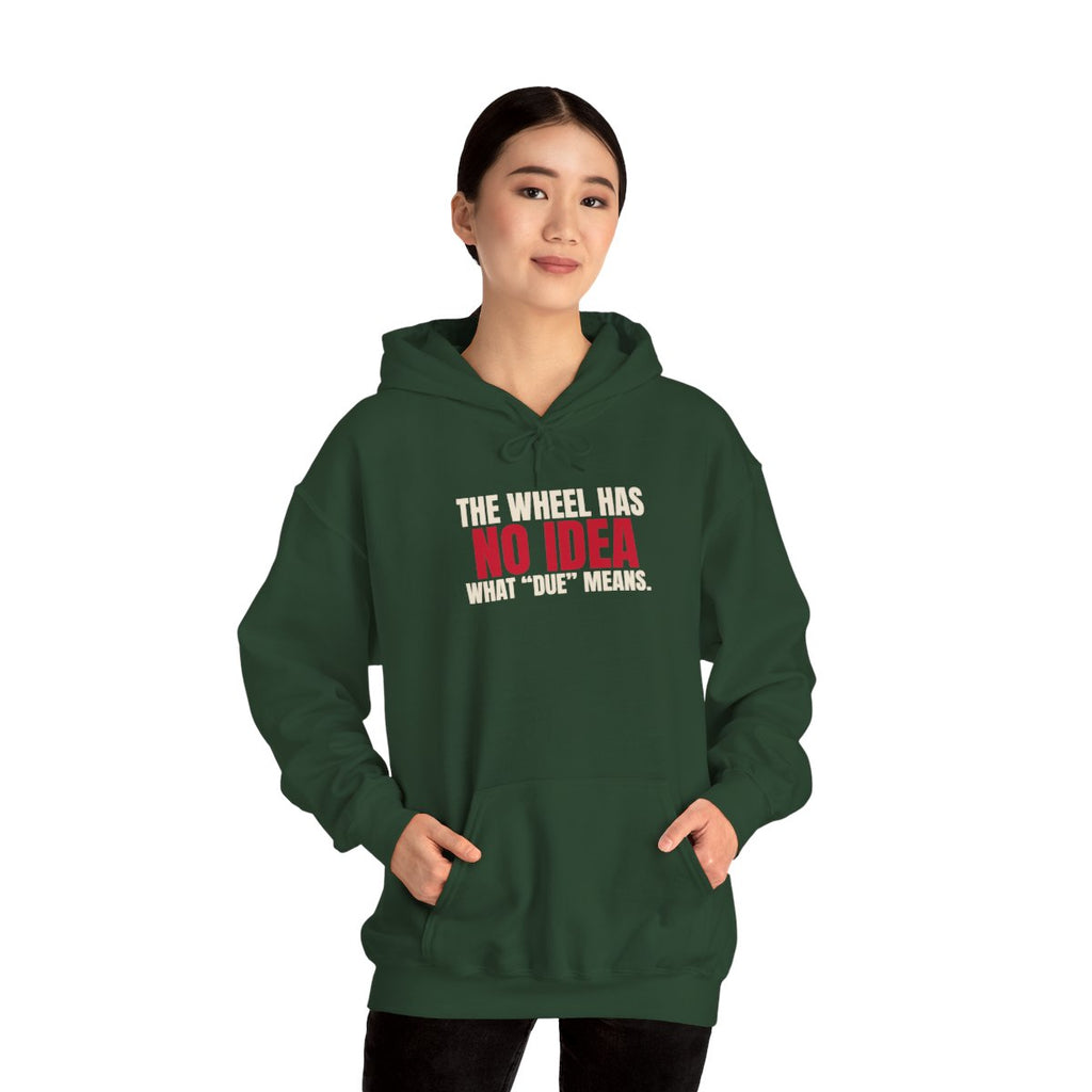 The Wheel Has No Idea What "Due" Means. — Roulette Hoodie (Forest Green, worn, front)