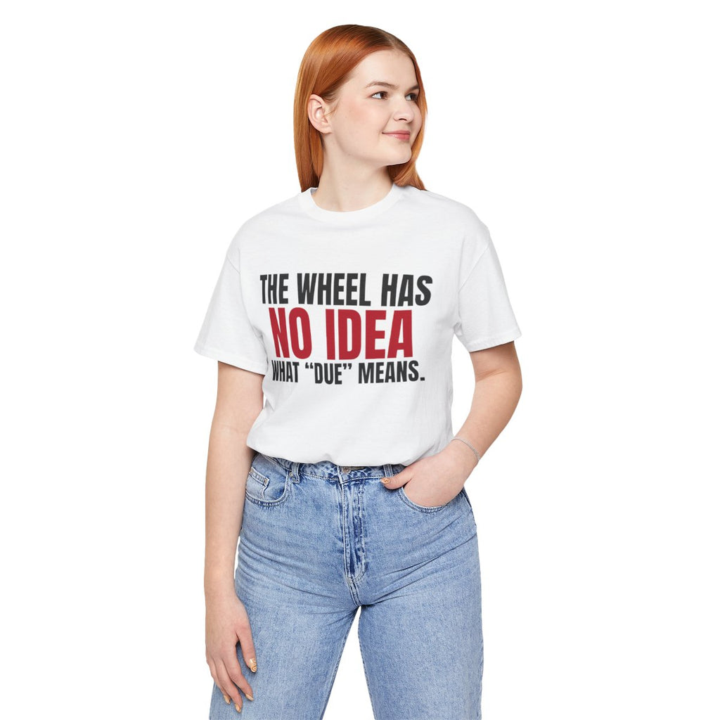 The Wheel Has No Idea What "Due" Means. — Roulette Tee (White, worn, front)