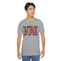 The Wheel Has No Idea What "Due" Means. — Roulette Tee (Athletic Heather, worn, front)