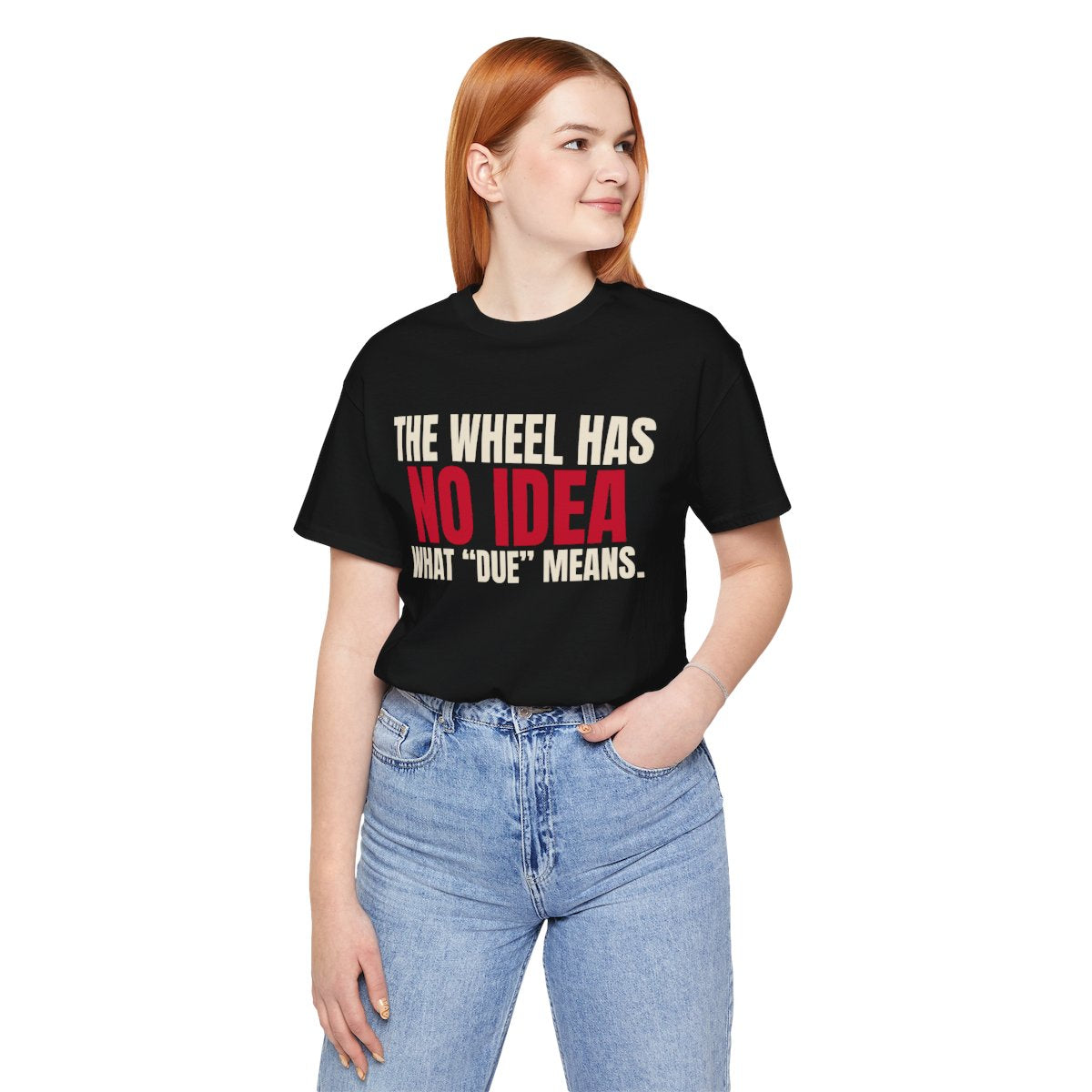 The Wheel Has No Idea What "Due" Means. — Roulette Tee (Black, worn, front)