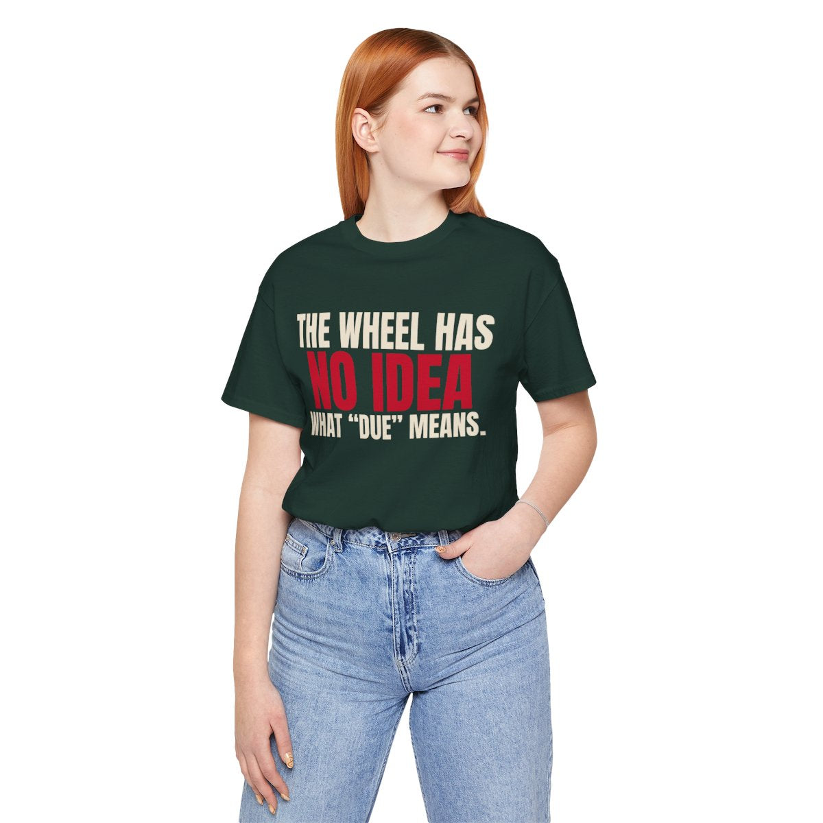 The Wheel Has No Idea What "Due" Means. — Roulette Tee (Forest, worn, front)