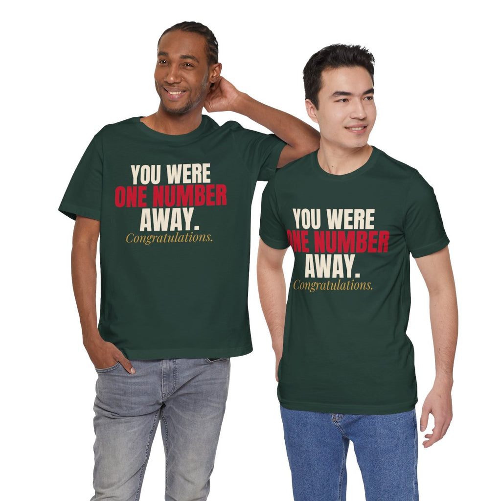 You Were One Number Away. Congratulations. — Roulette Tee (Forest, worn by two, front)